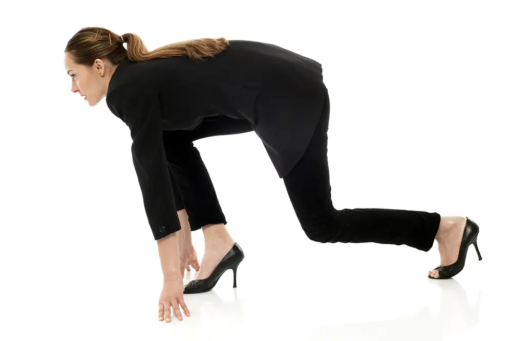 business woman running in heels