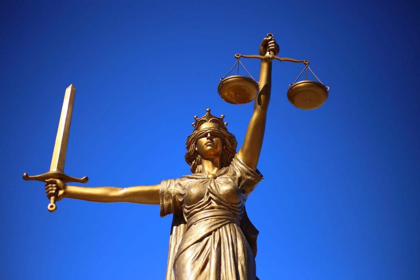 Statue of a woman holding the scales of justice
