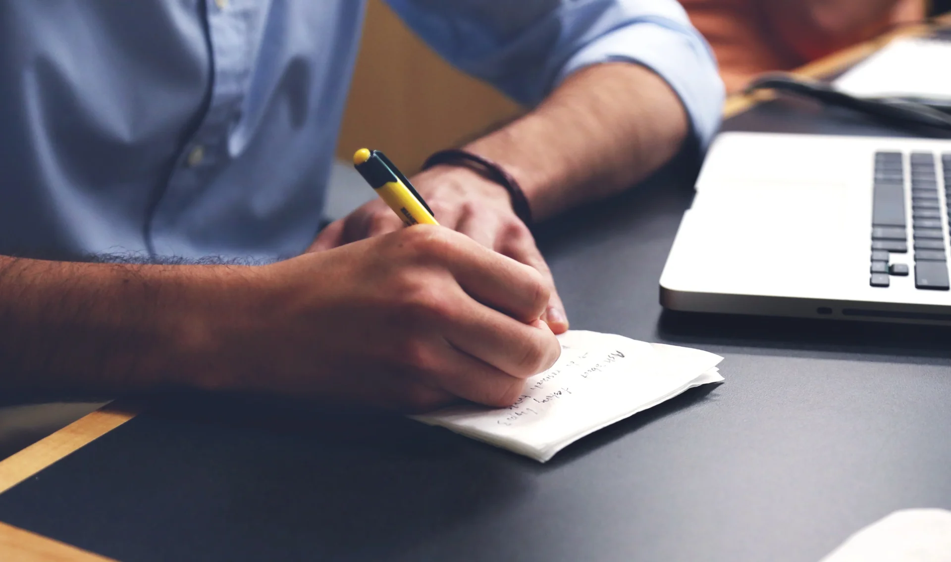 Man drafting content at his desk, illustrating B2B content marketing efforts