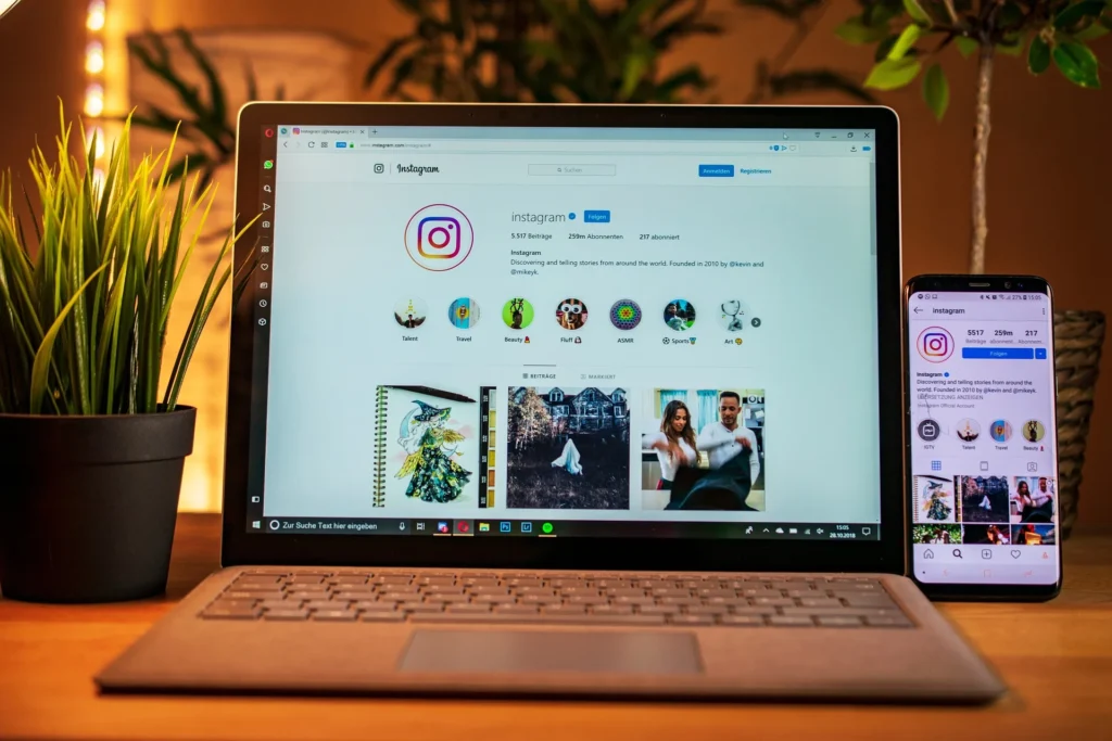 Laptop on a table with Instagram open, showcasing Instagram marketing in action