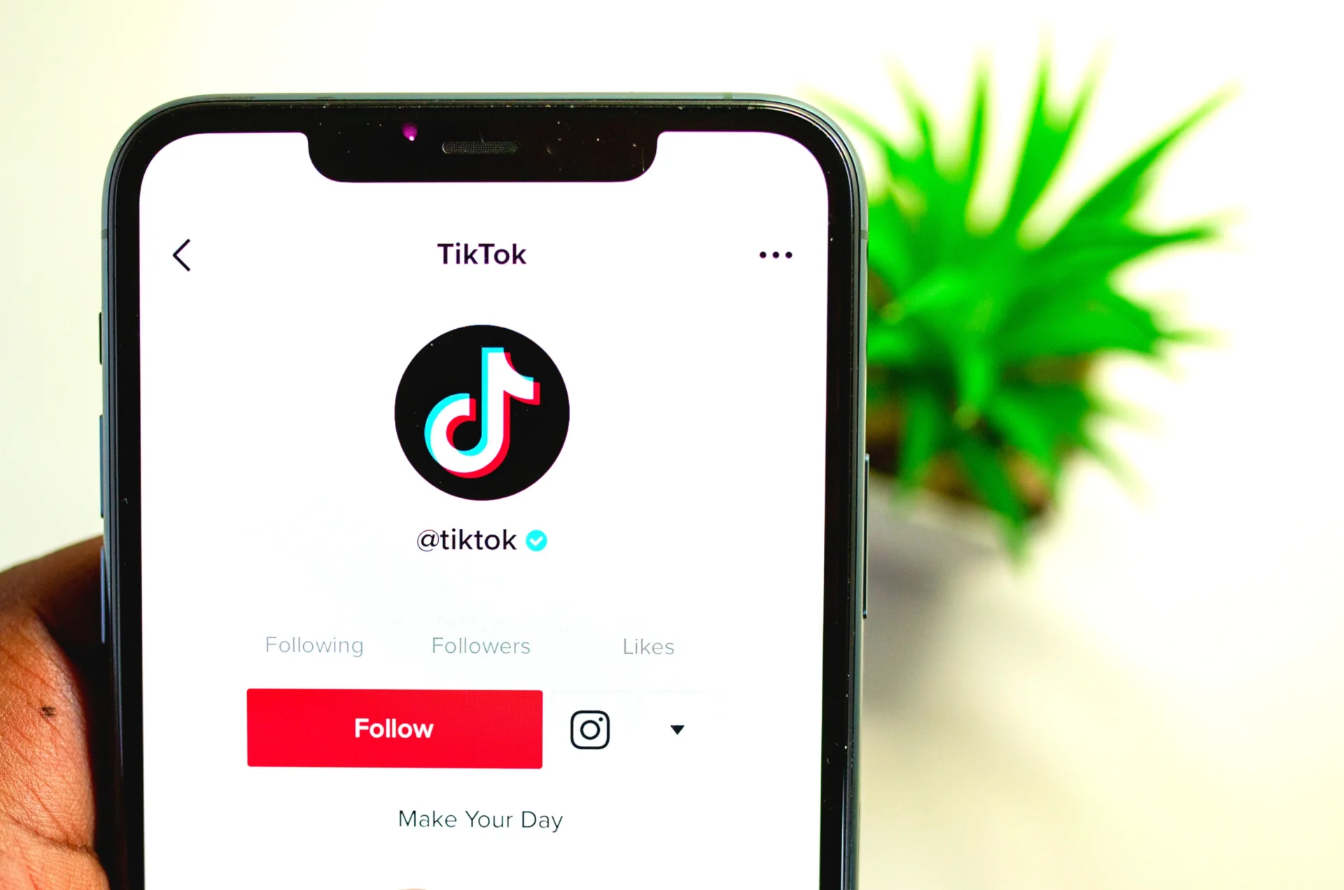 Smartphone displaying TikTok interface for TikTok marketing