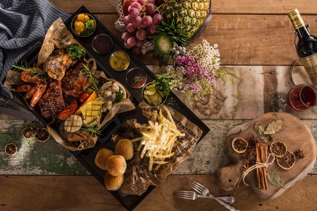 A beautifully arranged table featuring various food and beverages for a marketing campaign.