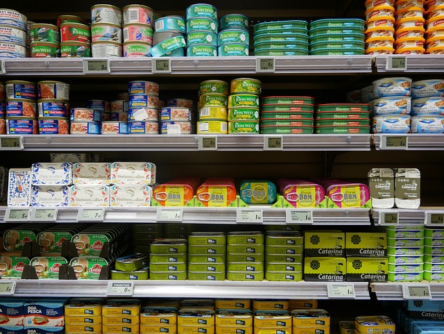 Diverse assortment of canned tuna brands, demonstrating effective CPG branding.