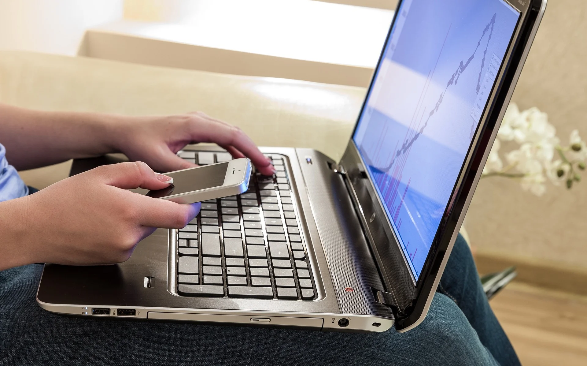 Person analyzing link building strategies on a laptop, focusing on white hat techniques for effective SEO.