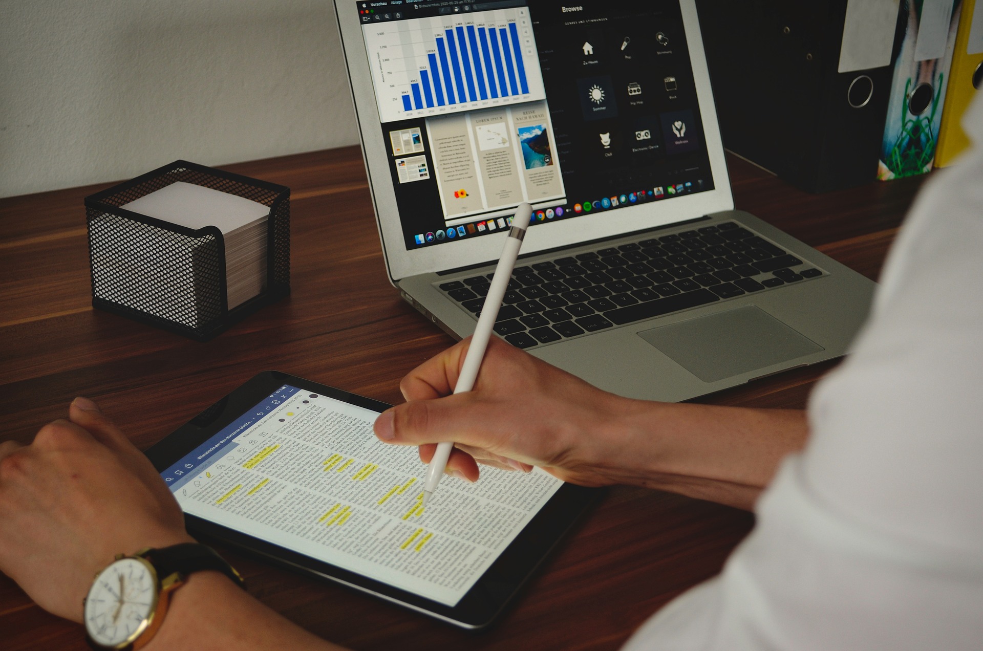 Person working on a laptop using the skyscraper technique for content strategy.