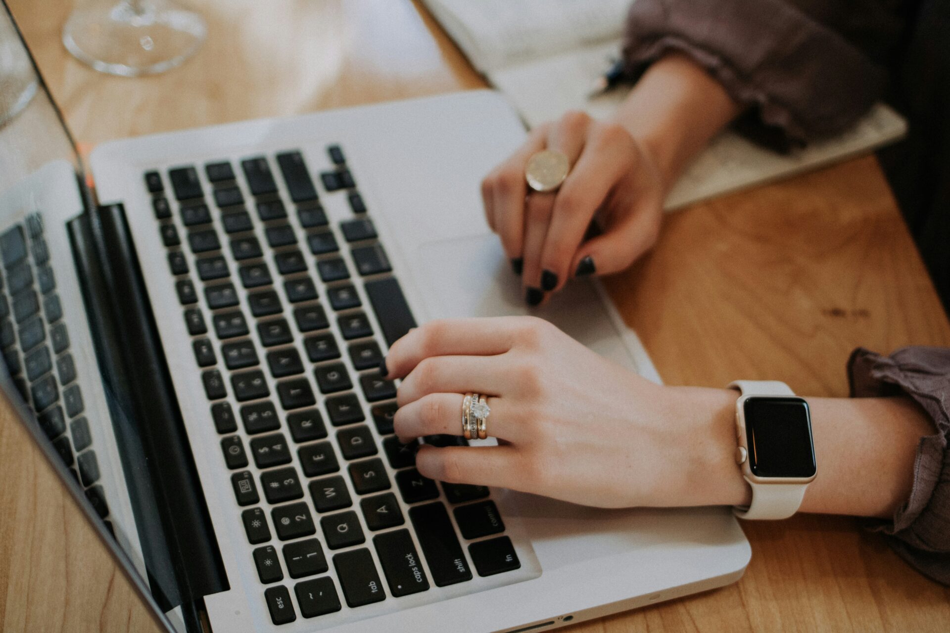 a digital marketing specialist working on a laptop, focused on digital marketing ROI optimization