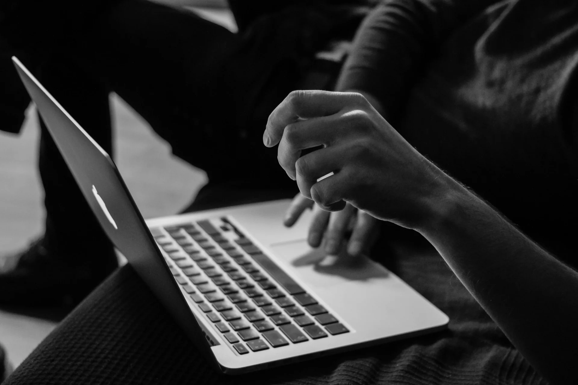 Digital marketing specialist using a laptop, demonstrating how behavioral targeting can personalize online experiences.