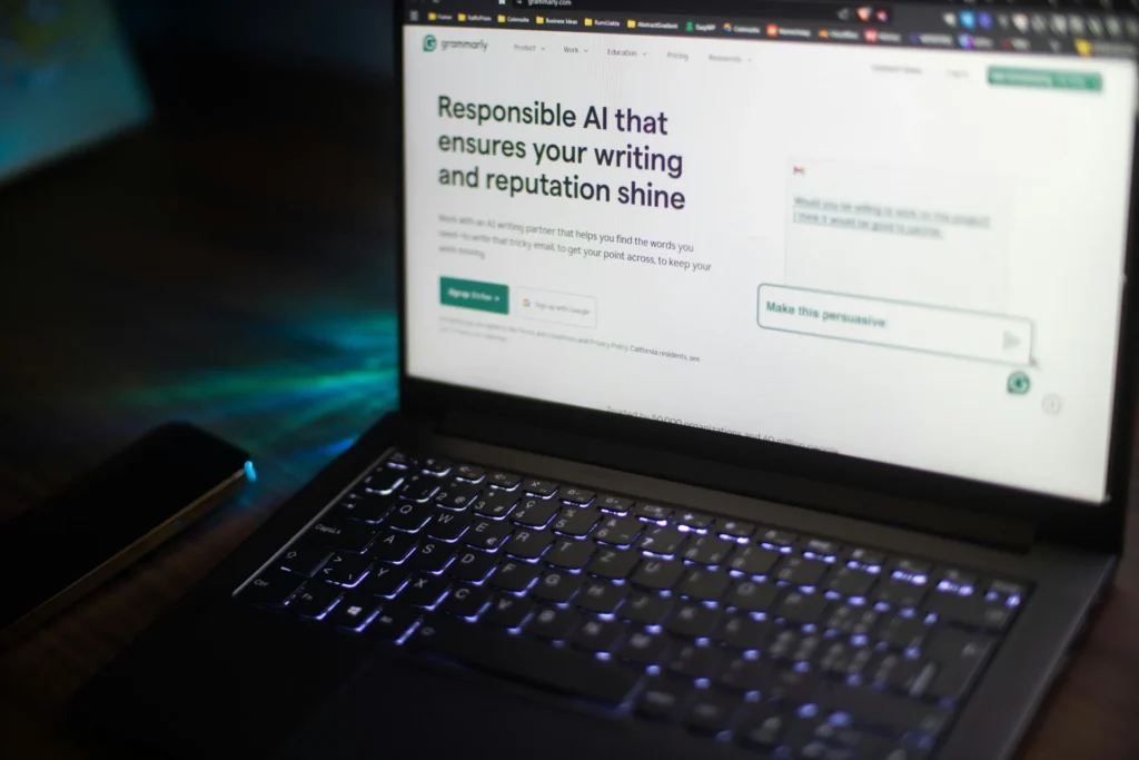 Laptop screen displaying the Grammarly website, an example of AI-powered tools used in AI driven SEO for content optimization and enhancing writing quality.