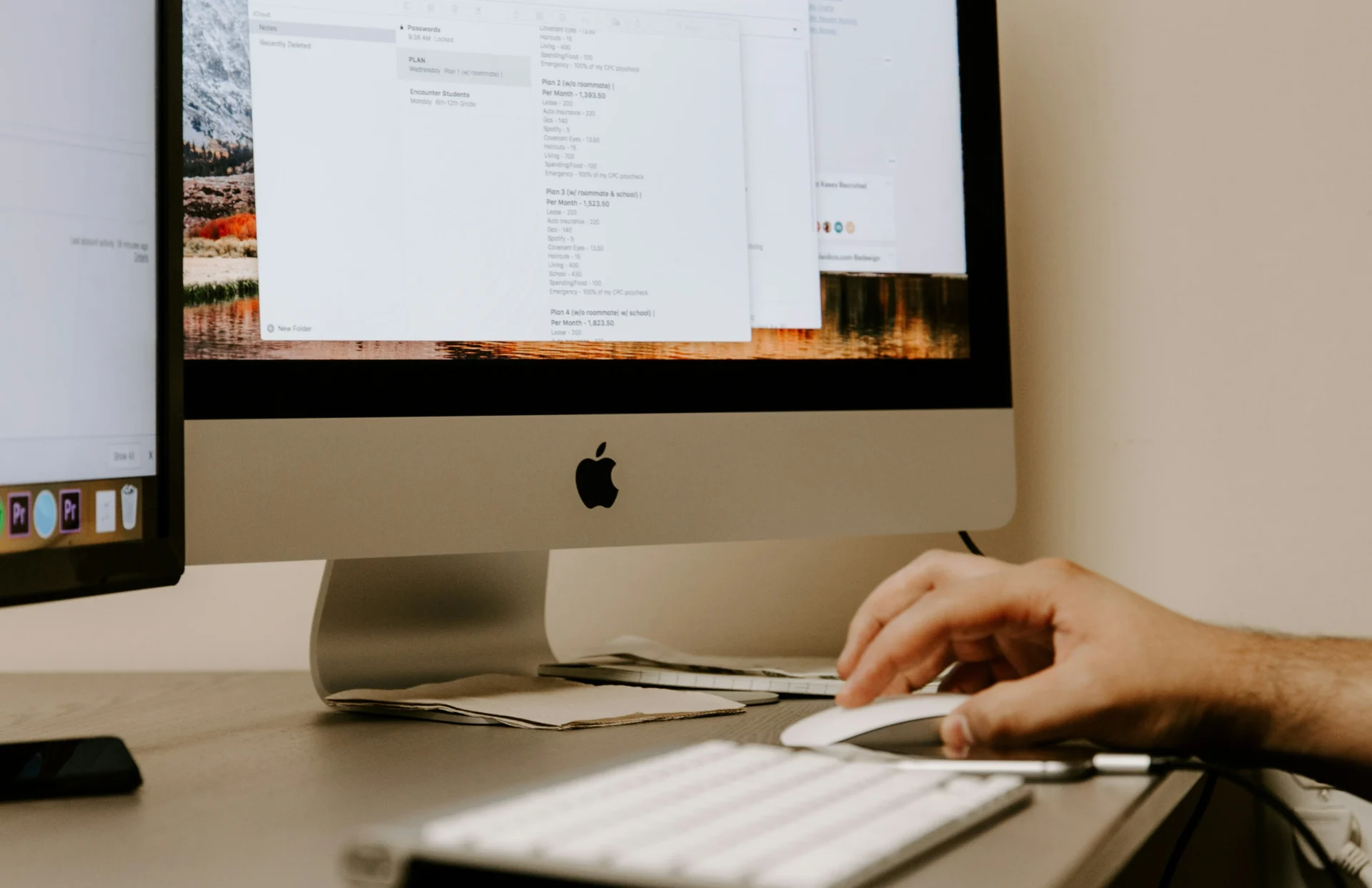 Hands typing on a MacBook displaying Google Search Console, demonstrating the use of SEO tools for small business.