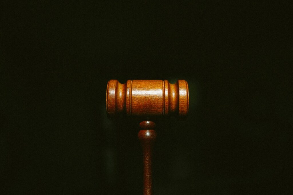 Wooden gavel against a dark background, symbolizing legal proceedings; best practices for Linkedin marketing for lawyers.